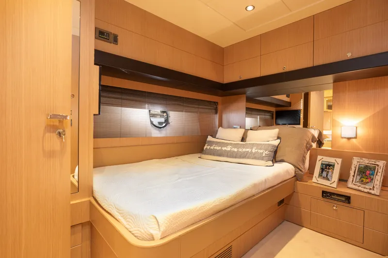 Slide: The Image of Luxurious bedroom interior of 2012 Riva 75 Venere yacht with modern wooden finish. - 31
