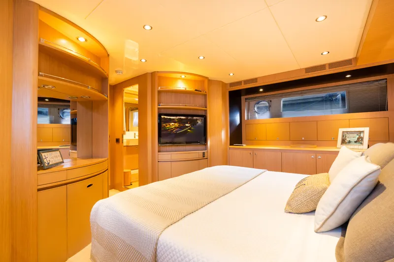 Slide: The Image of Luxurious master bedroom on 2012 Riva 75 Venere yacht with modern wooden interior. - 38