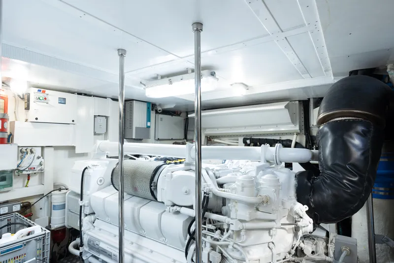 Slide: The Image of Engine room of a 2012 Riva 75 Venere yacht with white machinery. - 42