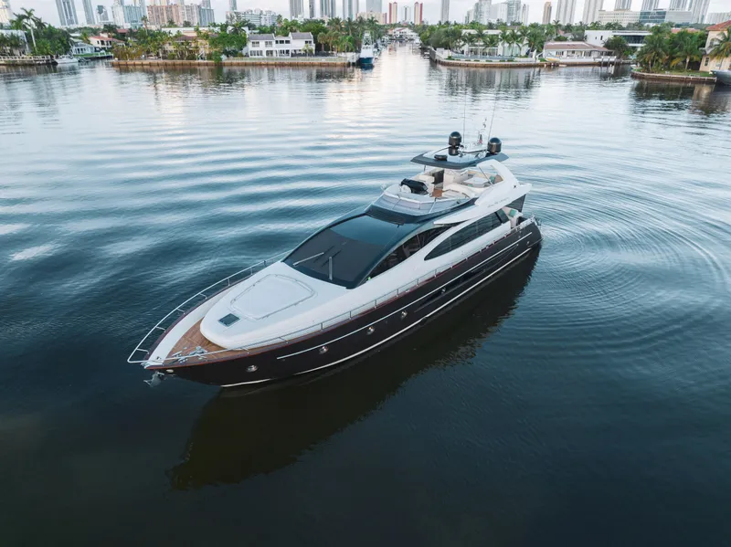 Slide: The Image of 2012 Riva 75 Venere luxury yacht cruising in a calm marina. - 7