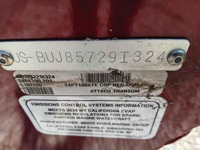 Slide: The Image of 2024 Tracker Pro Team 190 TX boat identification and emissions control information. - 7