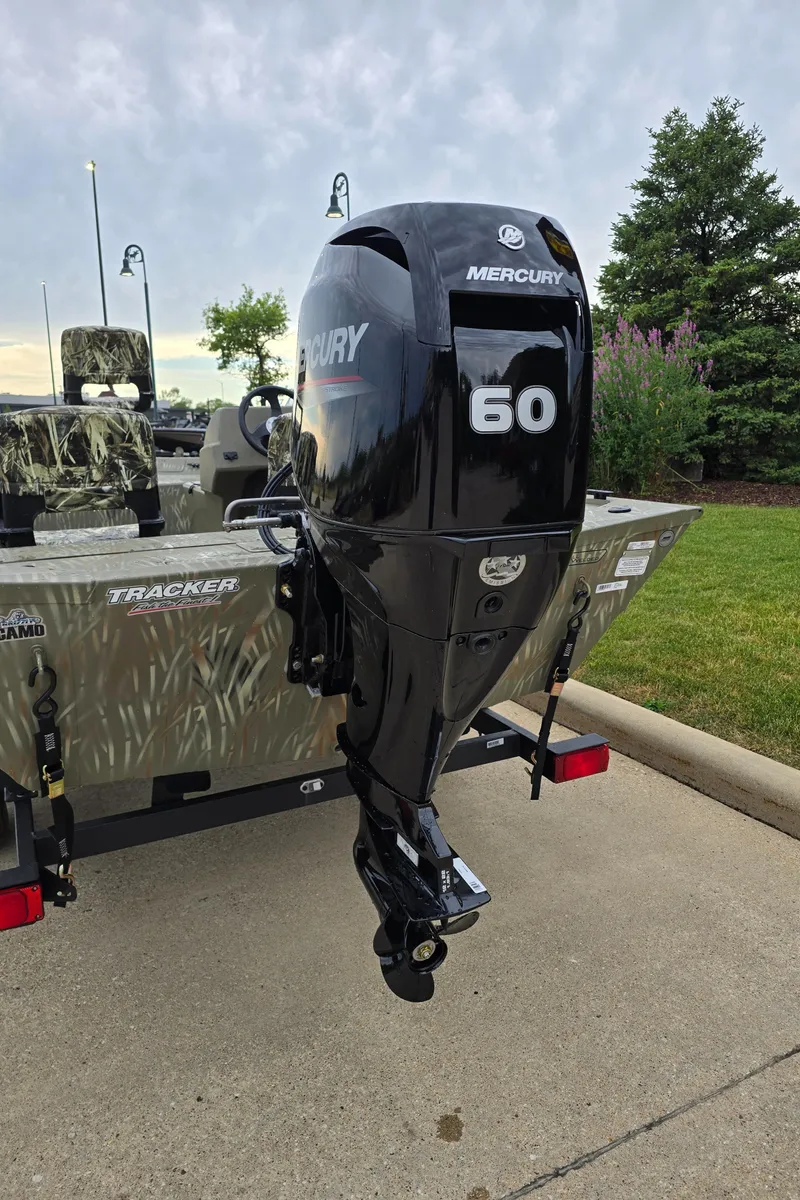 Slide: The Image of 2024 Tracker Grizzly 1754 SC boat with Mercury 60 outboard motor. - 3