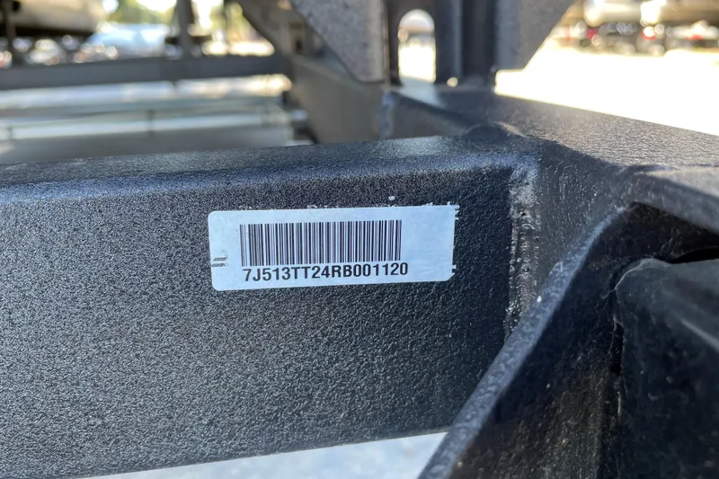 Slide: The Image of 2024 Sun Tracker Party Barge 24 DLX with visible barcode and serial number. - 61