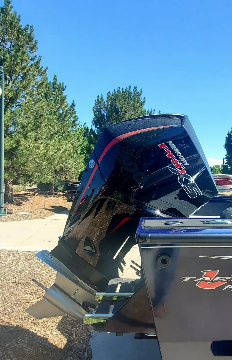 Slide: The Image of 2024 Tracker Targa V-19 WT boat with powerful outboard motor. - 5