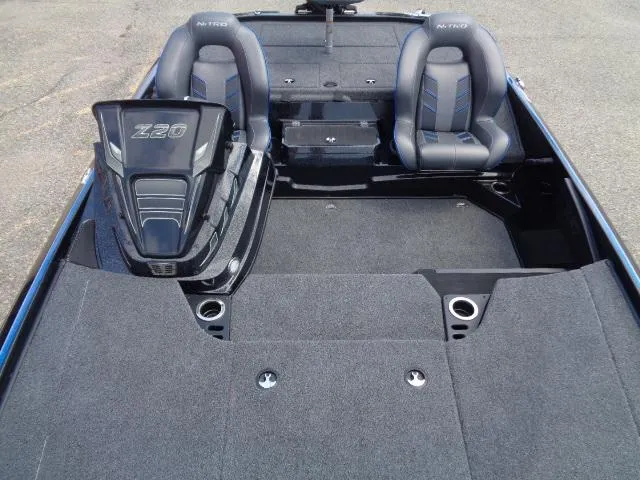 Slide: The Image of 2024 Nitro Z20 Pro boat interior with dual seats and spacious deck. - 11