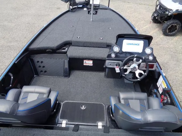 Slide: The Image of 2024 Nitro Z20 Pro boat interior with steering console and seating. - 6