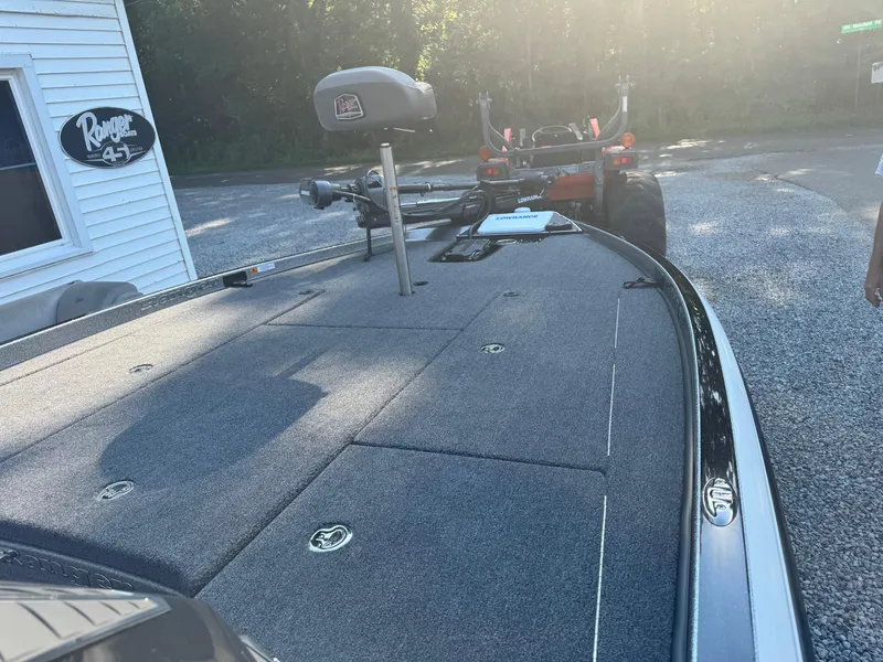 Slide: The Image of 2024 Ranger Z521R Ranger Cup Equipped boat deck with fishing gear. - 5