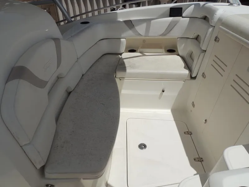 Slide: The Image of 2006 Boston Whaler 320 Outrage Cuddy Cabin interior seating area. - 18
