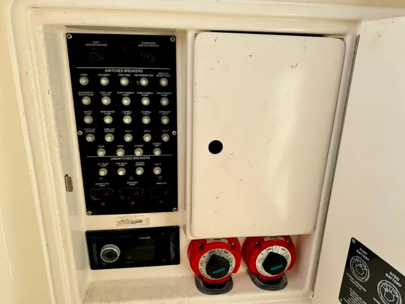 Slide: The Image of Electrical panel of a 2006 Boston Whaler 320 Outrage Cuddy Cabin boat. - 27
