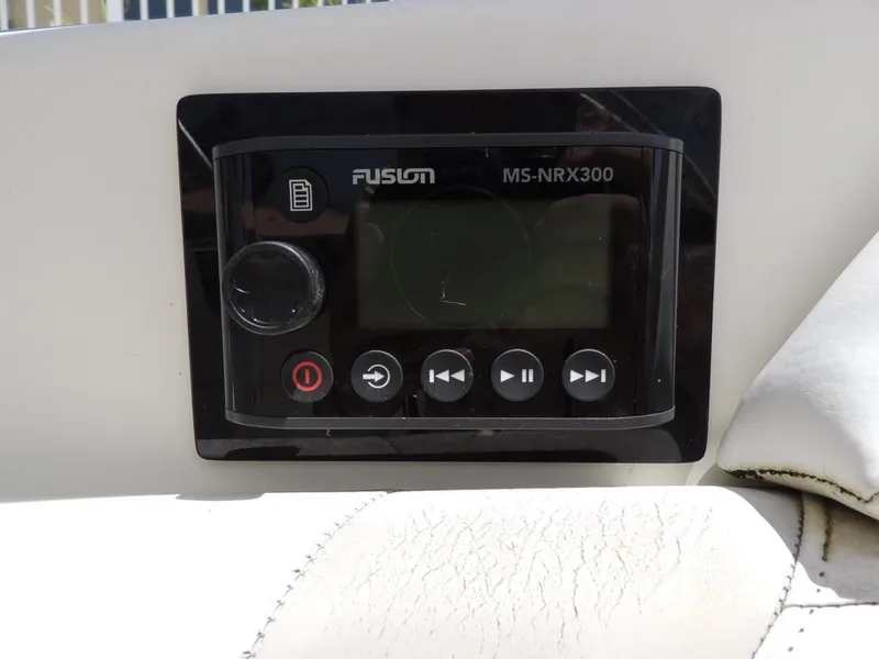 Slide: The Image of Fusion MS-NRX300 stereo system on a 2006 Boston Whaler 320 Outrage Cuddy Cabin. - 29