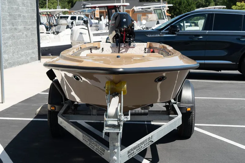 Slide: The Image of 2024 Mi Tide V1408 boat on trailer in parking lot. - 10