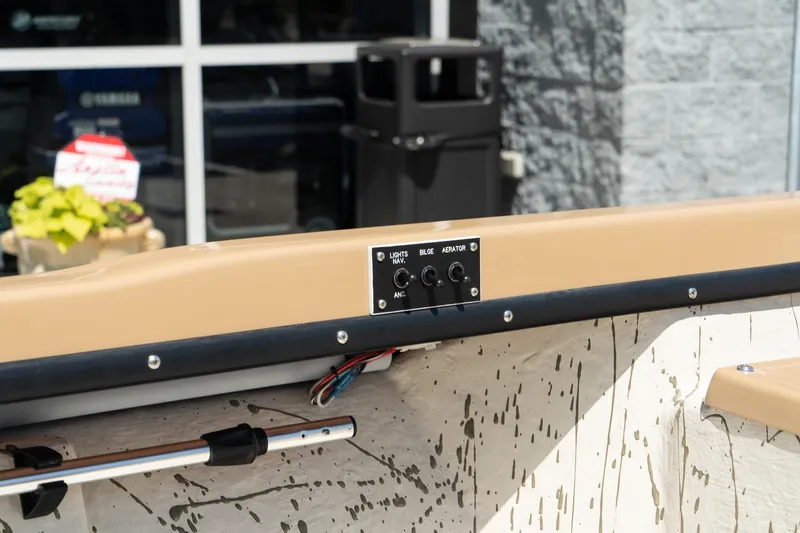 Slide: The Image of Control panel on Mi Tide V1408 boat, 2024 model, with switches for lights, bilge, and aerator. - 16