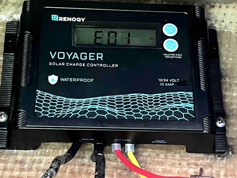 Slide: The Image of Renogy Voyager solar charge controller on 1990 MTI 26-Foot US NAVY Personnel Boat. - 42