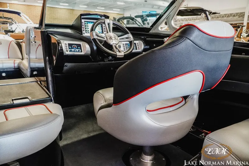 Slide: The Image of Interior of a 2014 MasterCraft XStar boat at Lake Norman Marina. - 11