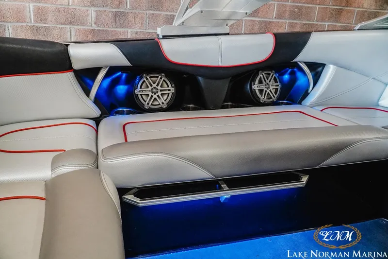 Slide: The Image of 2014 MasterCraft XStar interior with premium seating and built-in speakers. - 19