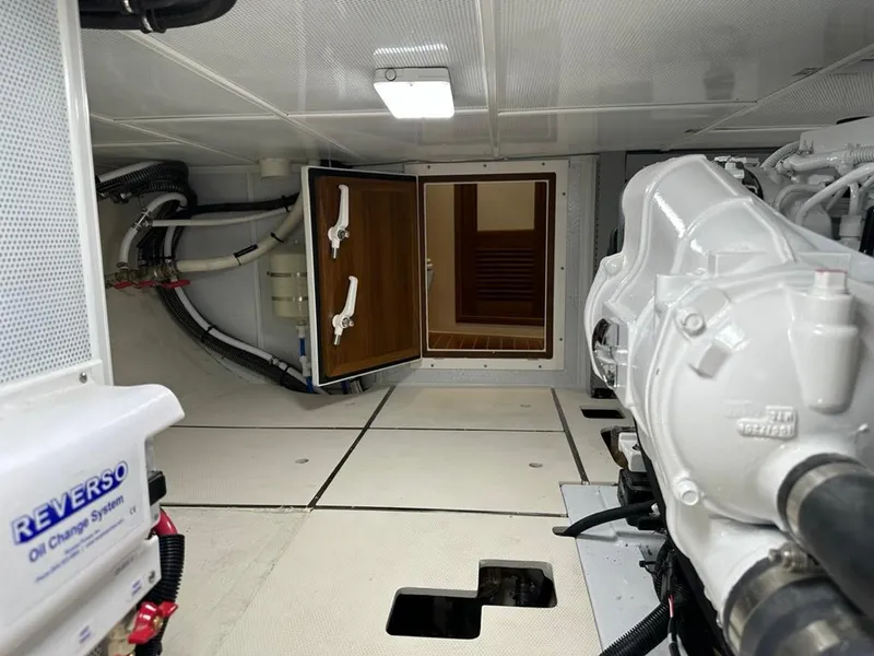 Slide: The Image of Engine room of 2024 Helmsman Trawlers 38 Sedan with Reverso oil change system. - 12