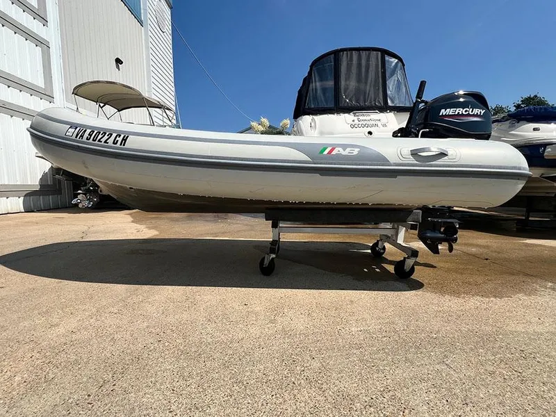 Slide: The Image of 2021 AB Inflatables AB 11 boat with Mercury outboard motor on trailer. - 4