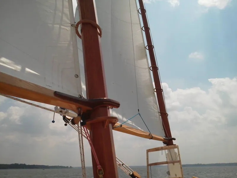 Slide: The Image of Custom 2011 Cat Ketch sailboat with white sails on a sunny day. - 3
