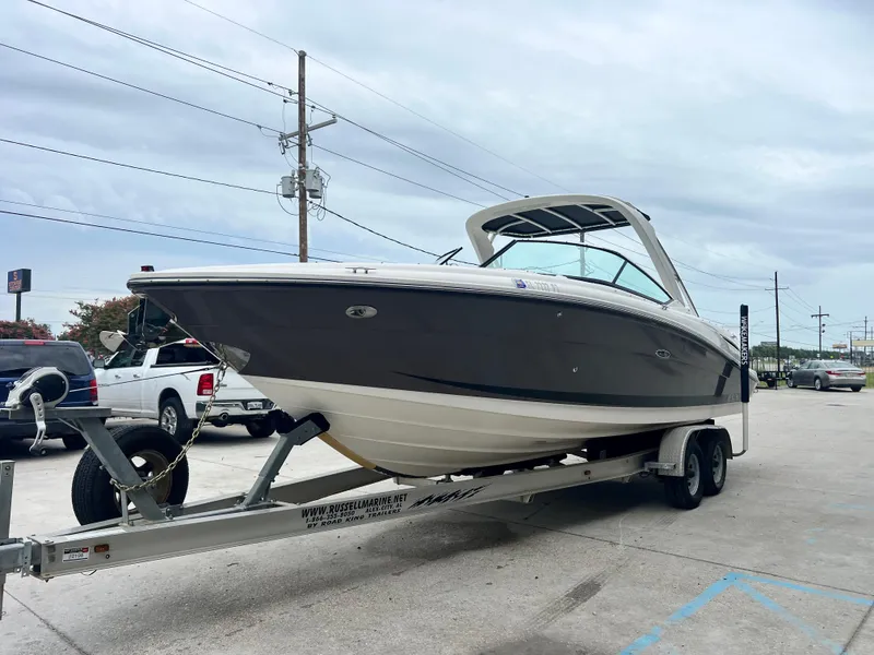 Slide: The Image of 2008 Sea Ray 270 Select EX boat on trailer, parked outdoors. - 3
