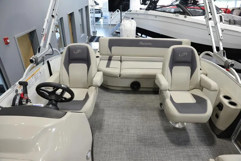 Slide: The Image of 2024 Barletta ARIA A20UC boat interior with plush seating and modern design. - 15