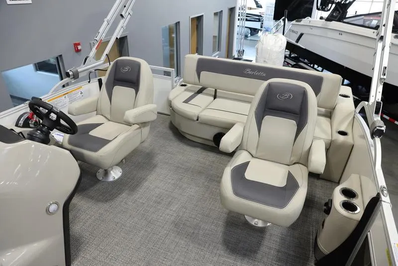 Slide: The Image of 2024 Barletta ARIA A20UC boat interior with plush seating and modern design. - 16