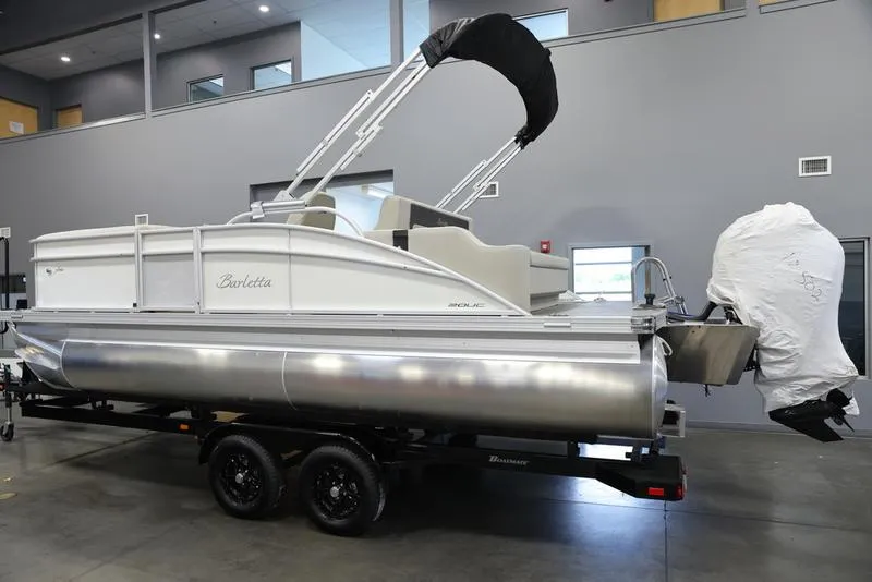 Slide: The Image of 2024 Barletta ARIA A20UC pontoon boat on trailer in showroom. - 19