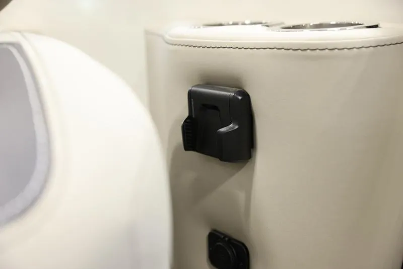 Slide: The Image of 2024 Barletta ARIA A20UC interior detail with cup holders and accessory mount. - 6