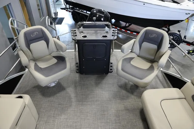 Slide: The Image of 2024 Barletta Aria A22CC boat interior with seating and console. - 10