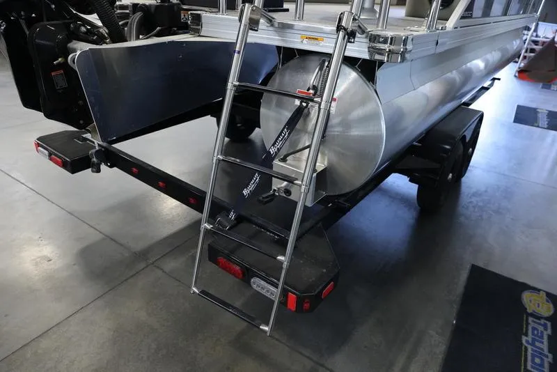 Slide: The Image of 2024 Barletta Aria A22CC pontoon boat rear view with ladder and trailer. - 14