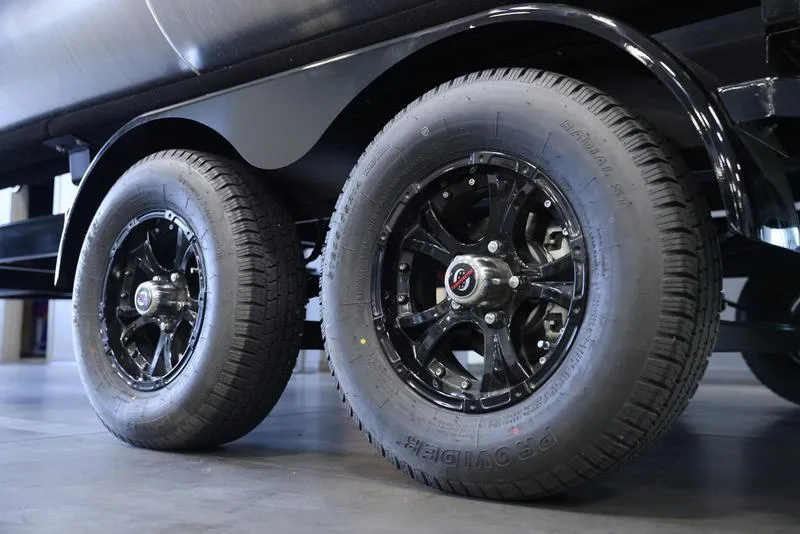 Slide: The Image of Close-up of 2024 Barletta Aria A22CC black alloy wheels and tires. - 8