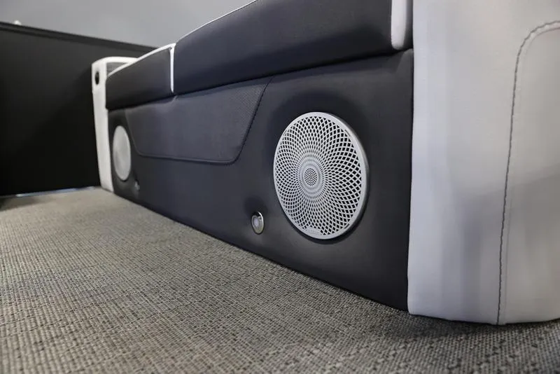 Slide: The Image of 2024 Barletta CORSA 25UE boat interior with built-in speakers. - 23