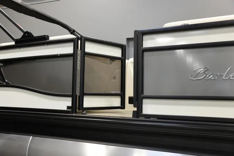 Slide: The Image of 2024 Barletta LUSSO L25M pontoon boat side gate and branding. - 11