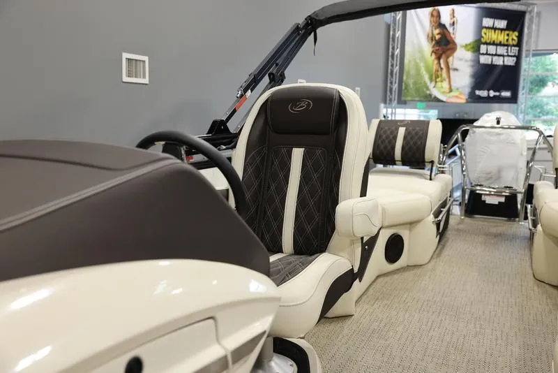 Slide: The Image of 2024 Barletta LUSSO L25M luxury pontoon boat interior with plush seating and modern design. - 19