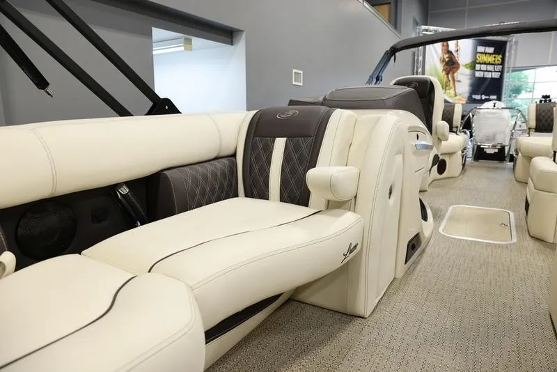 Slide: The Image of 2024 Barletta LUSSO L25M luxury pontoon boat interior with plush seating. - 20