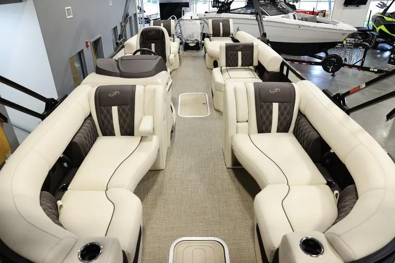 Slide: The Image of 2024 Barletta LUSSO L25M luxury pontoon boat interior with plush seating and modern design. - 21