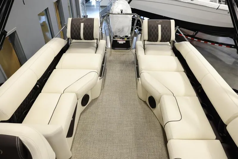 Slide: The Image of 2024 Barletta LUSSO L25M luxury pontoon boat interior with plush seating. - 24