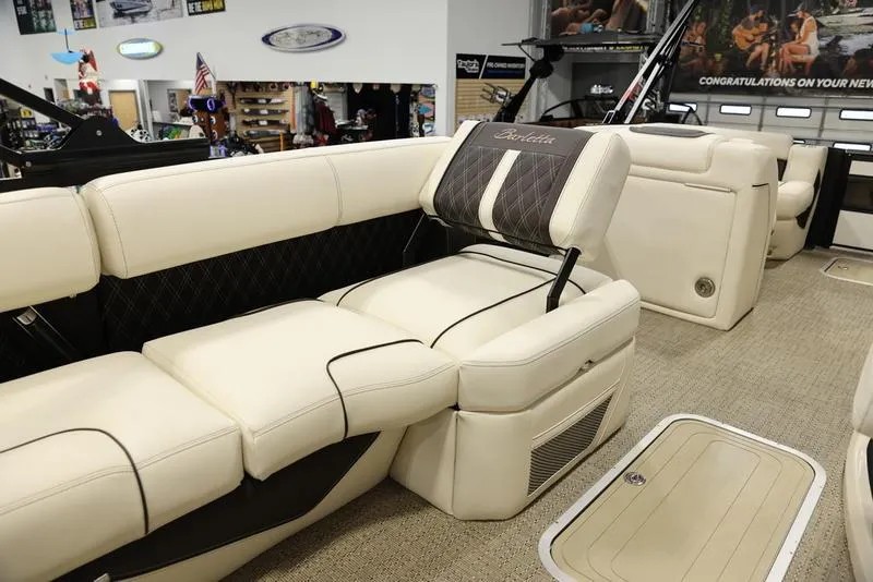 Slide: The Image of 2024 Barletta LUSSO L25M luxury boat interior with cream leather seating. - 25