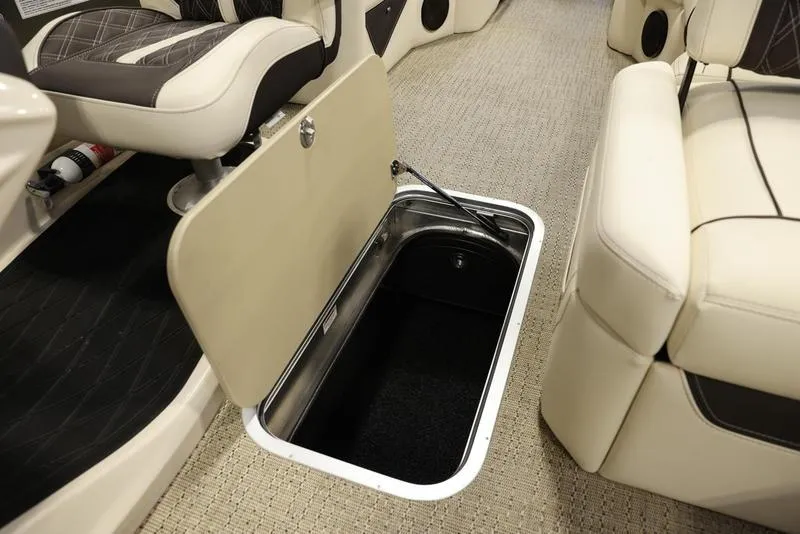 Slide: The Image of 2024 Barletta LUSSO L25M interior storage compartment with beige seating. - 33