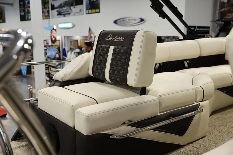 Slide: The Image of 2024 Barletta LUSSO L25M luxury boat interior with plush seating. - 35