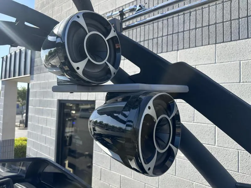 Slide: The Image of 2024 Malibu 23 MXZ boat tower speakers close-up. - 2