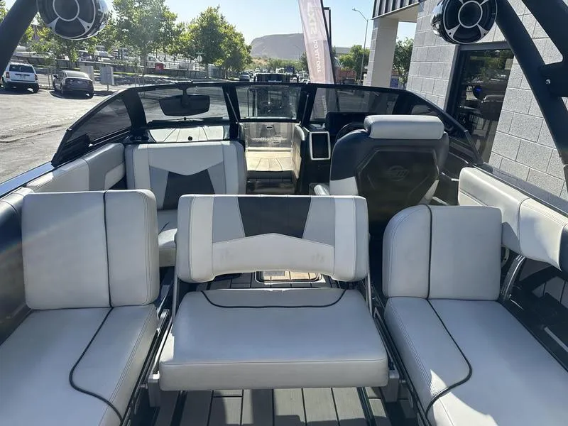 Slide: The Image of 2024 Malibu 23 MXZ boat interior with luxurious seating and modern design. - 4