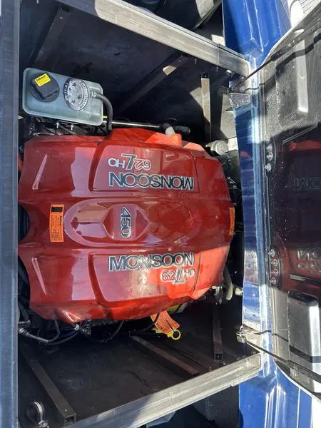 Slide: The Image of 2024 Malibu 23 MXZ Monsoon 6.2L engine in boat compartment. - 7