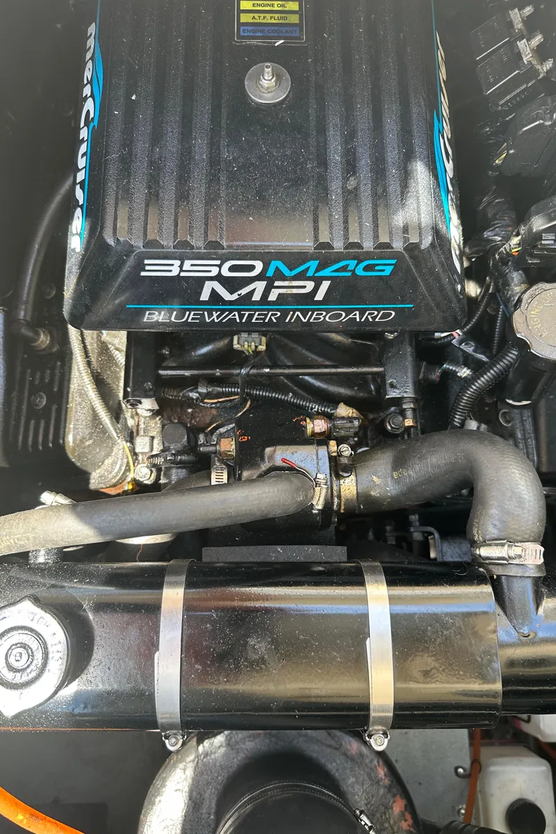 Slide: The Image of Engine of a 1999 Sea Ray 310 Sundancer with 350 MAG MPI Bluewater Inboard. - 24