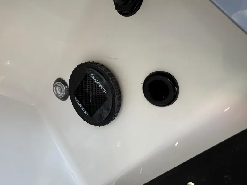 Slide: The Image of Close-up of Ranger Z521R 2025 boat's oxygenator and drain plug. - 12