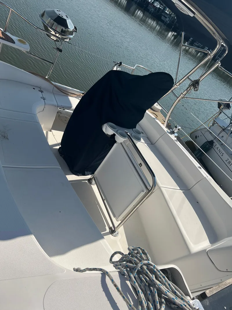 Slide: The Image of Cockpit of a 2009 Hunter 36 sailboat docked at a marina. - 3