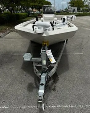 Slide: The Image of 2024 Ranger RB210 boat on trailer in parking lot. - 3
