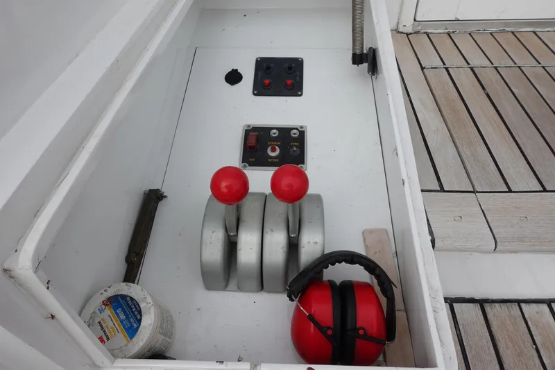 Slide: The Image of Control panel of 1988 Donzi Z-65 Tournament Fisherman with throttle levers and safety gear. - 10