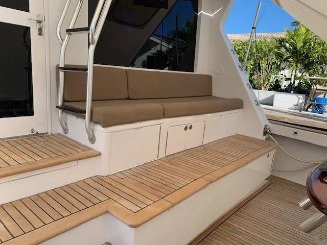 Slide: The Image of 1988 Donzi Z-65 Tournament Fisherman boat with cushioned seating and teak deck. - 12