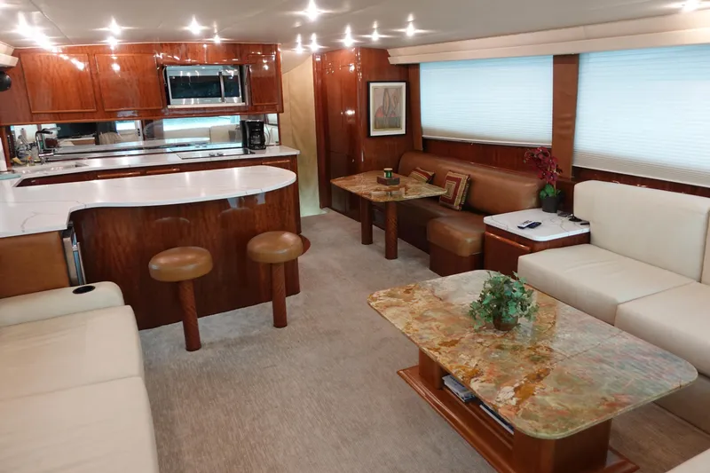Slide: The Image of Luxurious interior of 1988 Donzi Z-65 Tournament Fisherman yacht with modern kitchen and seating area. - 18