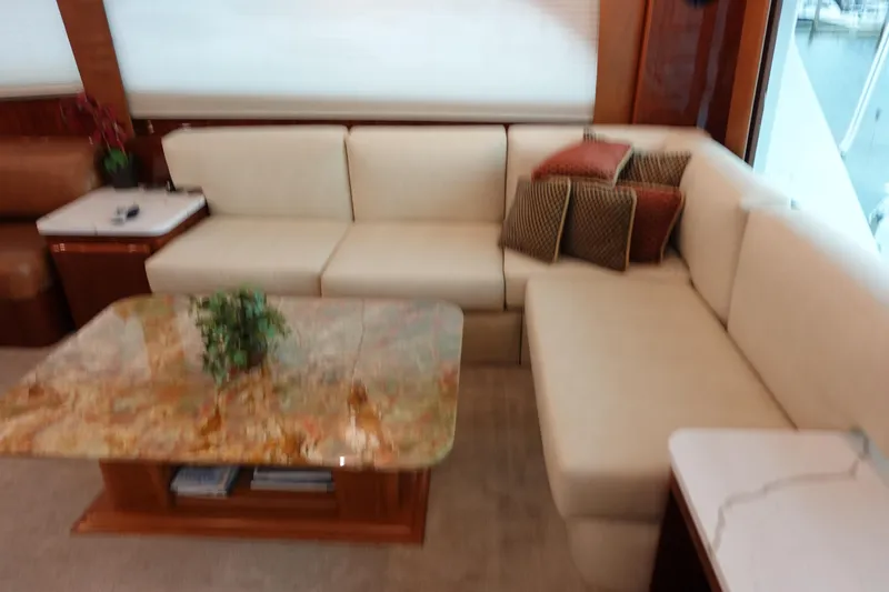Slide: The Image of Luxurious interior of 1988 Donzi Z-65 Tournament Fisherman yacht with elegant seating and marble table. - 20